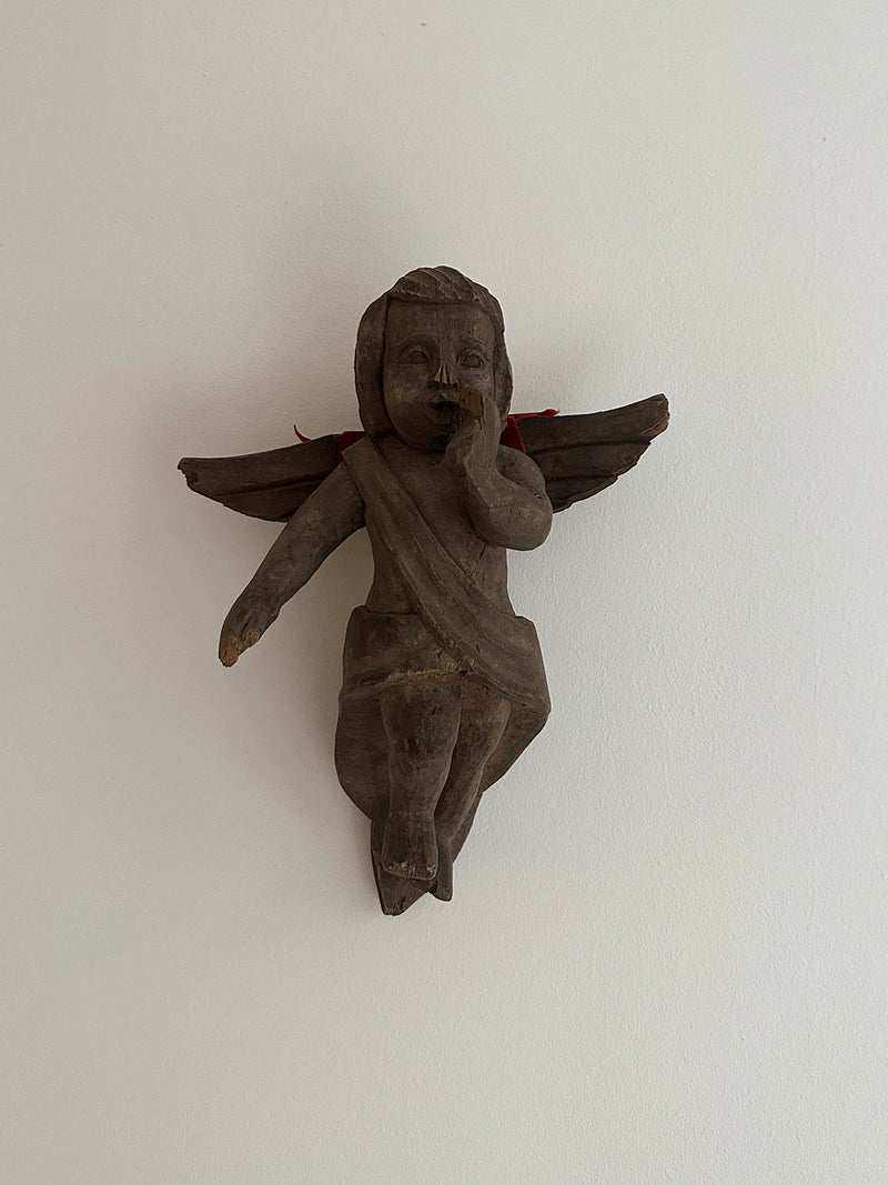 Carved wooden angel