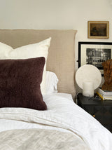a shearling lumbar pillow in chocolate brown shearling