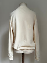 a comfy easy to wear sweatshirt in cream ivory with 'vintage' embroidered upside down for an abstract look