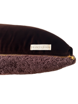 a square shearling pillow in chocolate brown shearling and plush velvet, with an exposed brass zipper