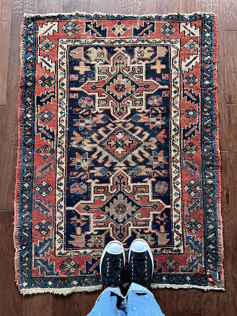 a mini antique heriz karajah rug 