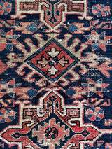a mini antique heriz karajah rug 