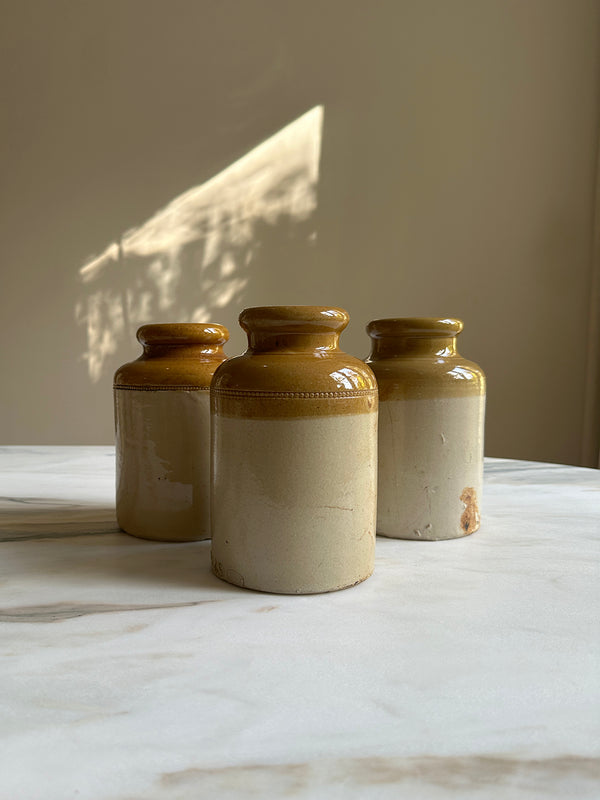Trio of stoneware jars