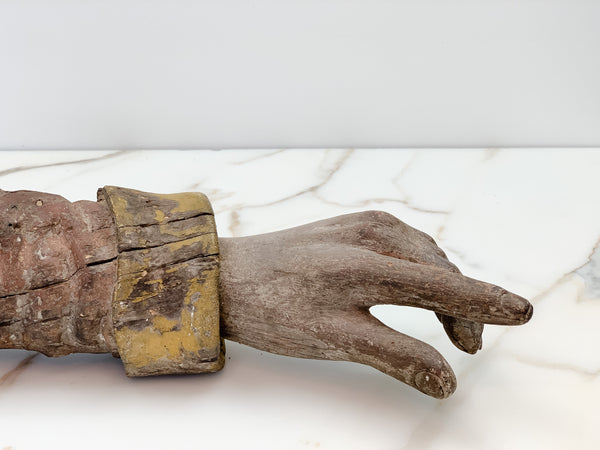 Hand-carved arm of a Saint