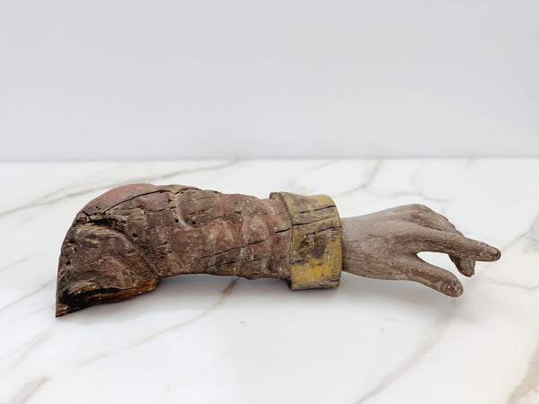 Hand-carved arm of a Saint