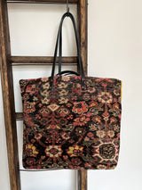 an everyday brownber hall bag with mahal rug and mustard yellow suede